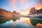 vibrant sunset hues behind geese v-formation over cliffs