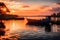 A vibrant sunset over a serene lakeside, with a small boat anchored near the shore