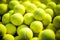 Vibrant tennis balls pattern background with new tennis balls for design or wallpaper