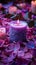 Vibrant violet candle amidst delicate pink and purple flower petals