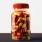 Vibrant vitamins fill clear bottle, red and yellow capsules inside