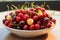 Vibrant white and red cherries in a bowl epitomize healthy, seasonal nutrition
