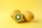 Vibrant Yellow Kiwi Fruits on Colorful Background AI Generated