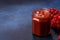 Viburnum fruit jam in a glass jar on a dark concrete background