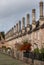 Vicars` Close, in Wells, Somerset UK. Street of medieval terraced houses with iconic chimneys behind Wells Cathedral.