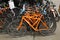 Vicenza, VI, Italy - January 1, 2017: Warehouse of orange bicycles for eco-sustainable tourism in the headquarters of famous tour