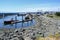 Victoria, British Columbia, Canada - June 17, 2018: Tugboats and sea boats moored at the pier close to Ogden Point Breakwater.