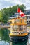 VICTORIA, CANADA - AUGUST 14, 2017: City chequered water taxi with canadian flag in the city port