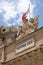 Victoria Gate carvings and Maltese Flag, Valletta, Malta