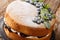 Victoria sponge cake recipe combines blueberry jam and cream closeup on the slate board. Horizontal