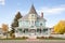 victorian home with a freshly painted turret and trim