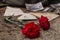 Victory Day. Carnations on a background of rusty iron with old military letters and photographs. The Great Patriotic War
