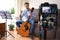 Video Blogger teaching play guitar with camera recording at home