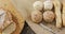 Video of bread on chopping wooden board on wooden worktop