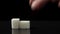 Video of building tower with white sugar cubes