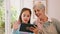 Video call, grandmother and girl with tablet, connection and communication. Digital, granny and female grandchild device