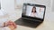 video call virtual conference employee laptop