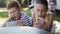 Video of children with mobile phone on camping holiday