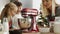 Video of children next to electric mixer during Christmas baking.