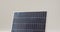 Video of close up of solar panel on white background