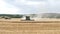 Video of combined harvester threshing machine cutting, harvesting corn Rotherham South Yorkshire UK