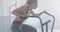Video of determined caucasian woman on exercise bike working out at a gym
