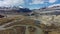 Video from a drone flying along valley of the Chuya river in Spring season with mount Sukor on background. Altai, Siberia, Russia