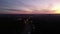 Video with the drone over the city at sunset, Plane flying in the background
