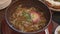 A video of eating udon with pork. Japanese cuisine Beef udon with Clear Soup.
