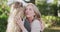 Video of emotional caucasian senior mother and adult daughter hugging in garden