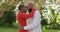 Video of happy african american couple embracing in autumn garden