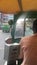 Video of an indian driving an auto rickshaw in the city