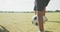 Video of legs of diverse boys playing soccer on sports field