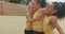 Video of legs of diverse girls hugging after soccer match in front of school