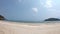 The Video moves from left to the right side of  Sandy beaches and light waves in the bay Background sea and island at Phraya
