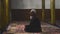 Video of an old muslim man praying in mosque
