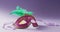 Video of pink carnival masquerade mask with green feathers on white and purple background