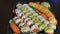 Video of a platter of sushi rolls with both raw and cooked ingredients 1080p HD