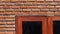 Video Red brick wall texture with wooden frame window