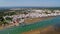 Video shooting aerial, the Ria Formosa canal of the village Cabanas de Tavira. Water tourism and traditional fishing