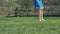 Video shows a young boy kicking a soccerball barfoot