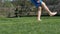 Video shows a young boy kicking a soccerball barfoot