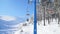 Video of ski lift and ski slope with skiers and snowboarders