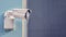 Video surveillance camera on the building, monitoring the security of a residential house, copy space