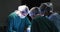 Video of three diverse female surgeons operating on patient in operating theatre