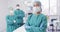 Video of three diverse surgeons dressed for operation in operating theatre