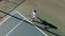 Video of top view of caucasian female tennis player on court