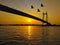 Vidyasagar bridge setu on river Hooghly. Kolkata Prinsep Ghat Sunset click flying birds front of camera.
