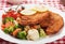 Viener schnitzel, breaded steak with healthy vegetables