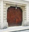 Vienna, Austria - 15 April 2018: ancient wooden doors. main entrance with family coat of arms.